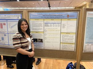 Jami Lily Musoff with poster presentation